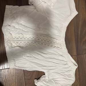 White Off the Shoulder Ruffle Crop Top